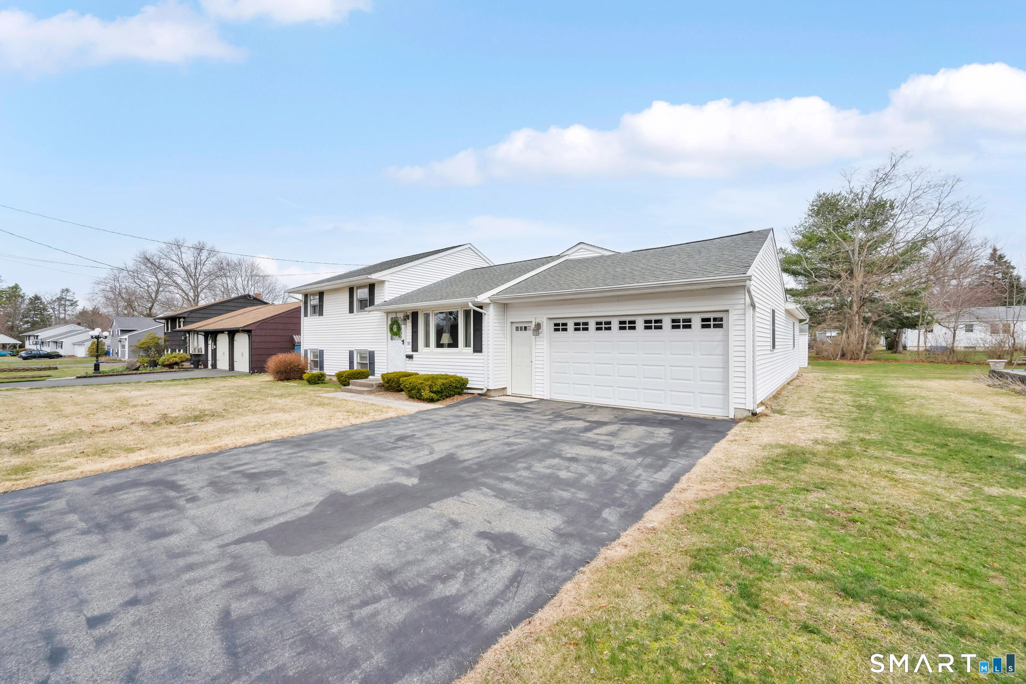50 Carr Street Wallingford, CT 06492 - Photo 2 of 34 a view of an house with backyard and parking