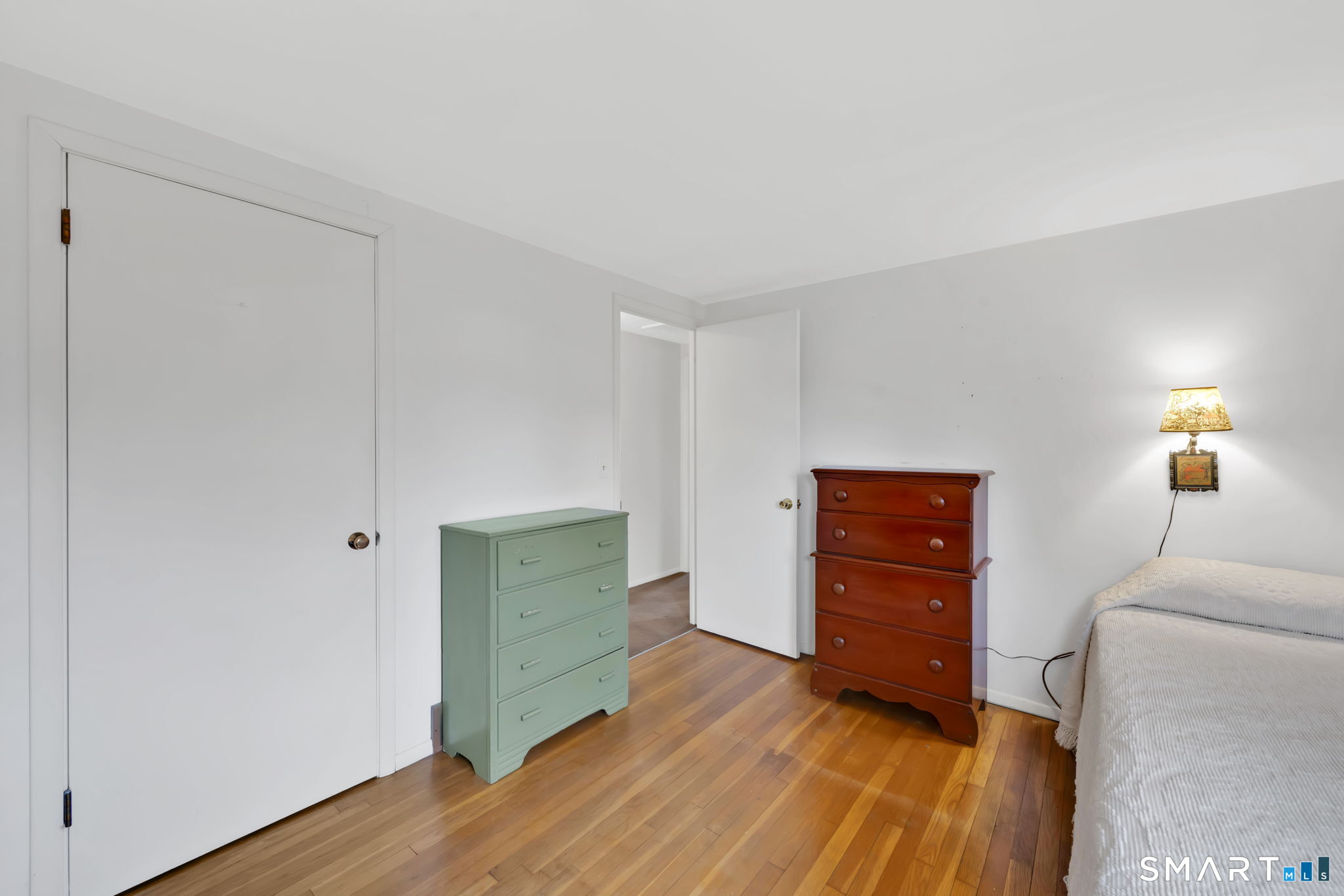 50 Carr Street Wallingford, CT 06492 - Photo 24 of 34 a room with furniture and a wooden floor