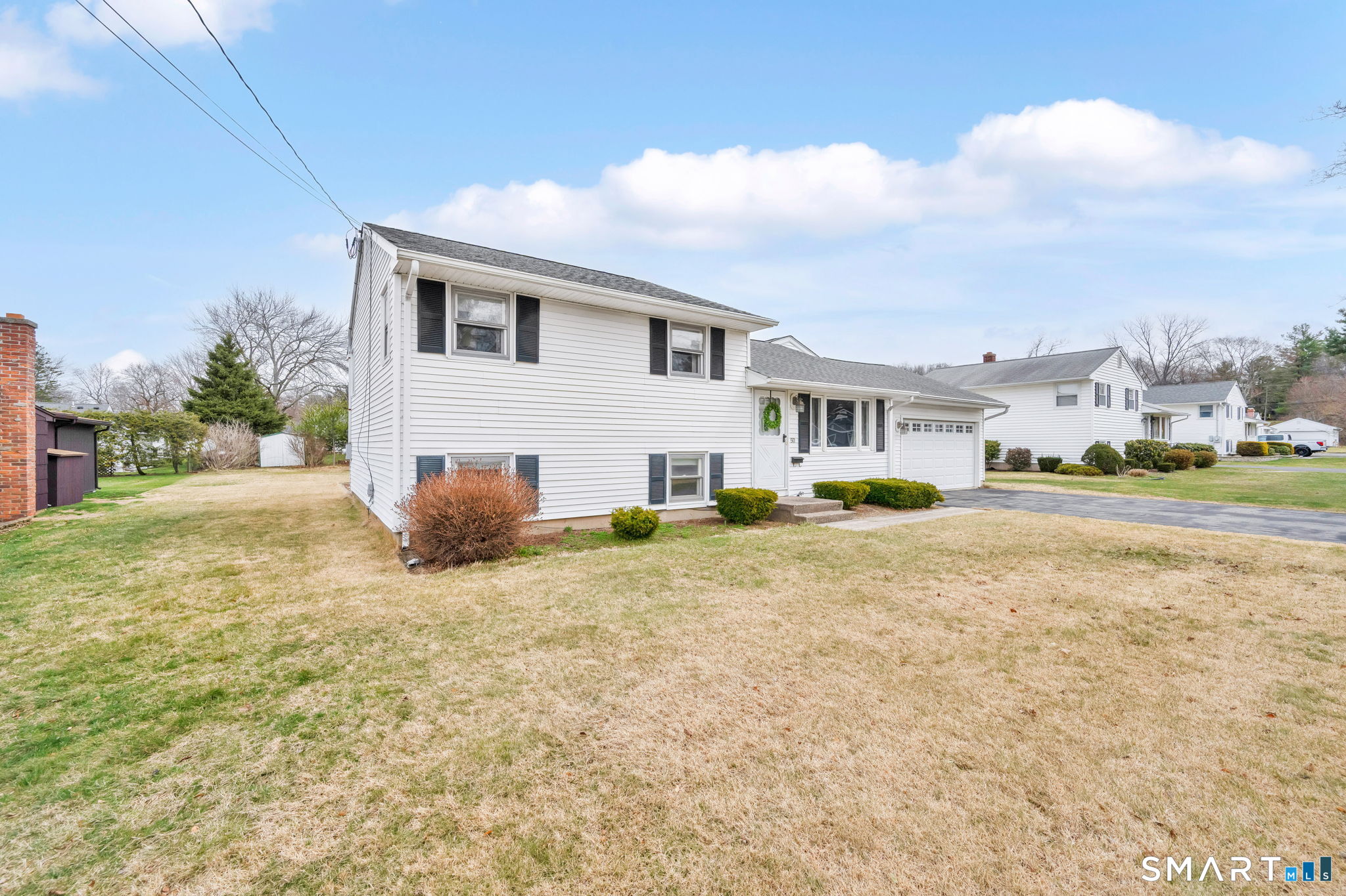 50 Carr Street Wallingford, CT 06492 - Photo 3 of 34 a view of a house with a yard