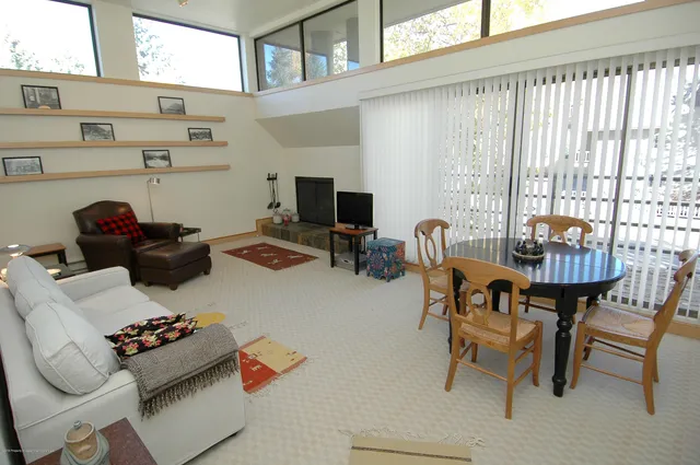 a room with furniture and a window