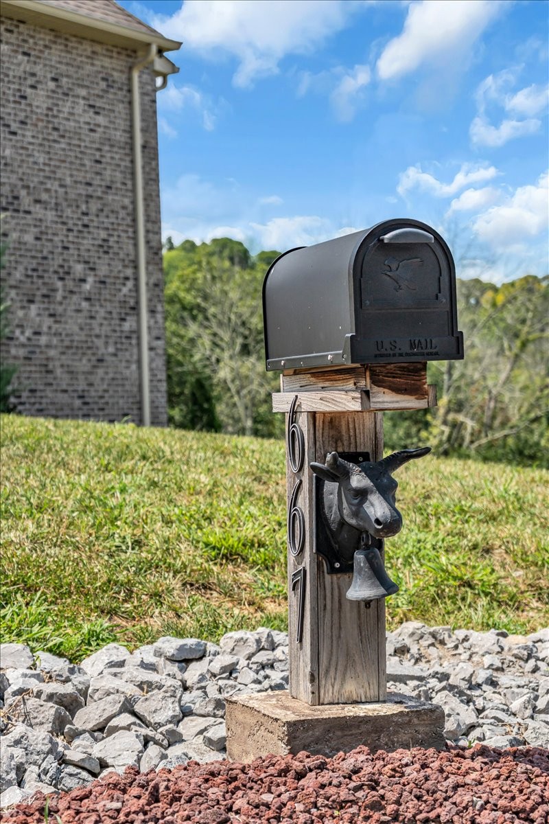 667 Rutherford Lane Smithville, TN 37166 - Photo 14 of 89 a front view of a house with a yard