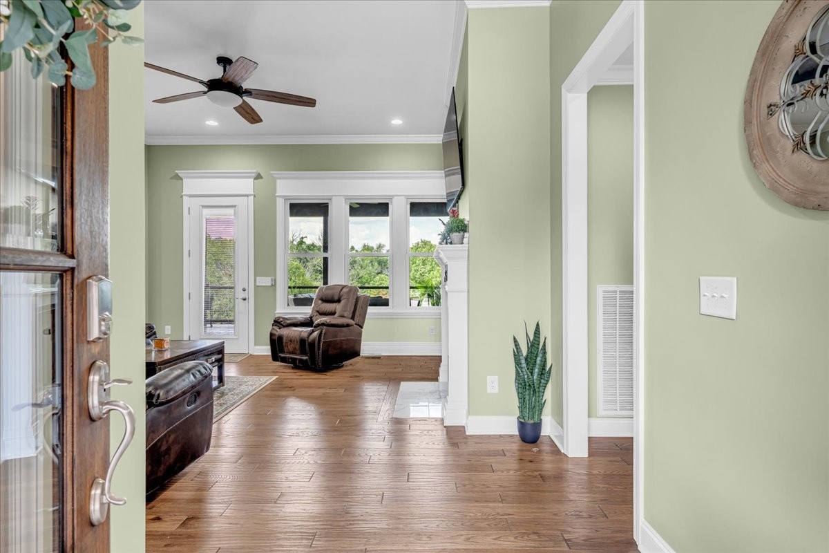 667 Rutherford Lane Smithville, TN 37166 - Photo 16 of 89 a living room with furniture and a large mirror