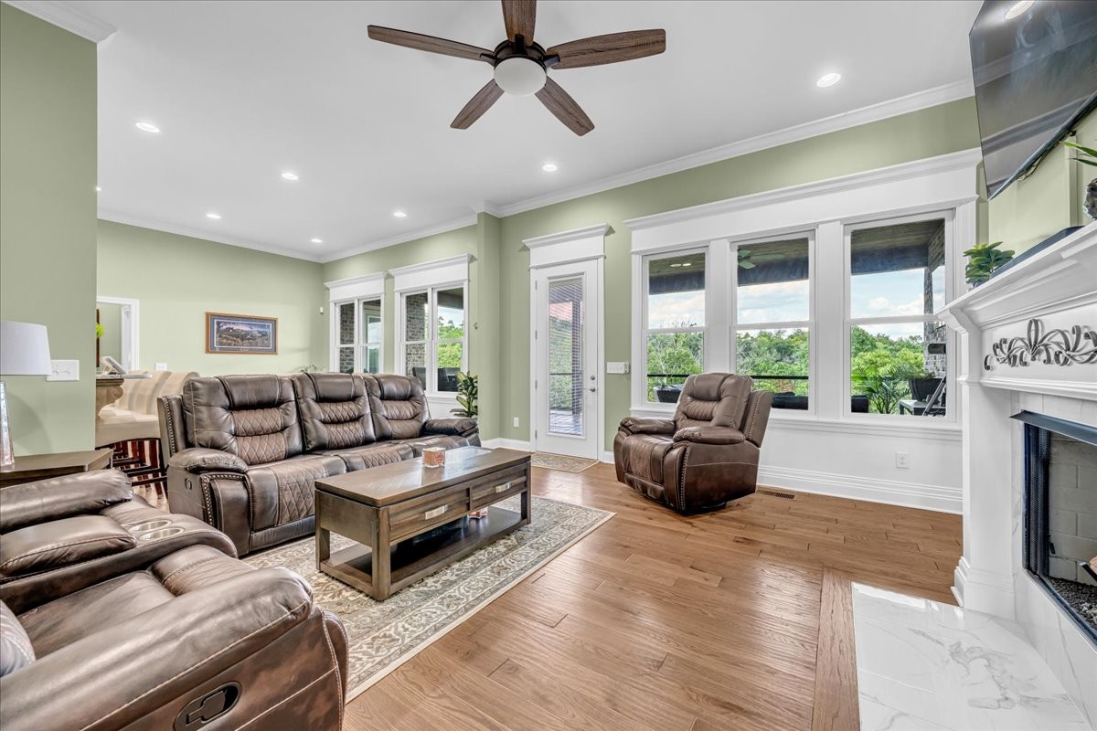 667 Rutherford Lane Smithville, TN 37166 - Photo 17 of 89 a living room with furniture and a fireplace