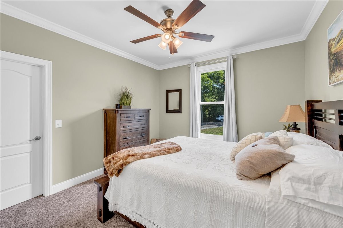 667 Rutherford Lane Smithville, TN 37166 - Photo 57 of 89 a bedroom with a bed and a window