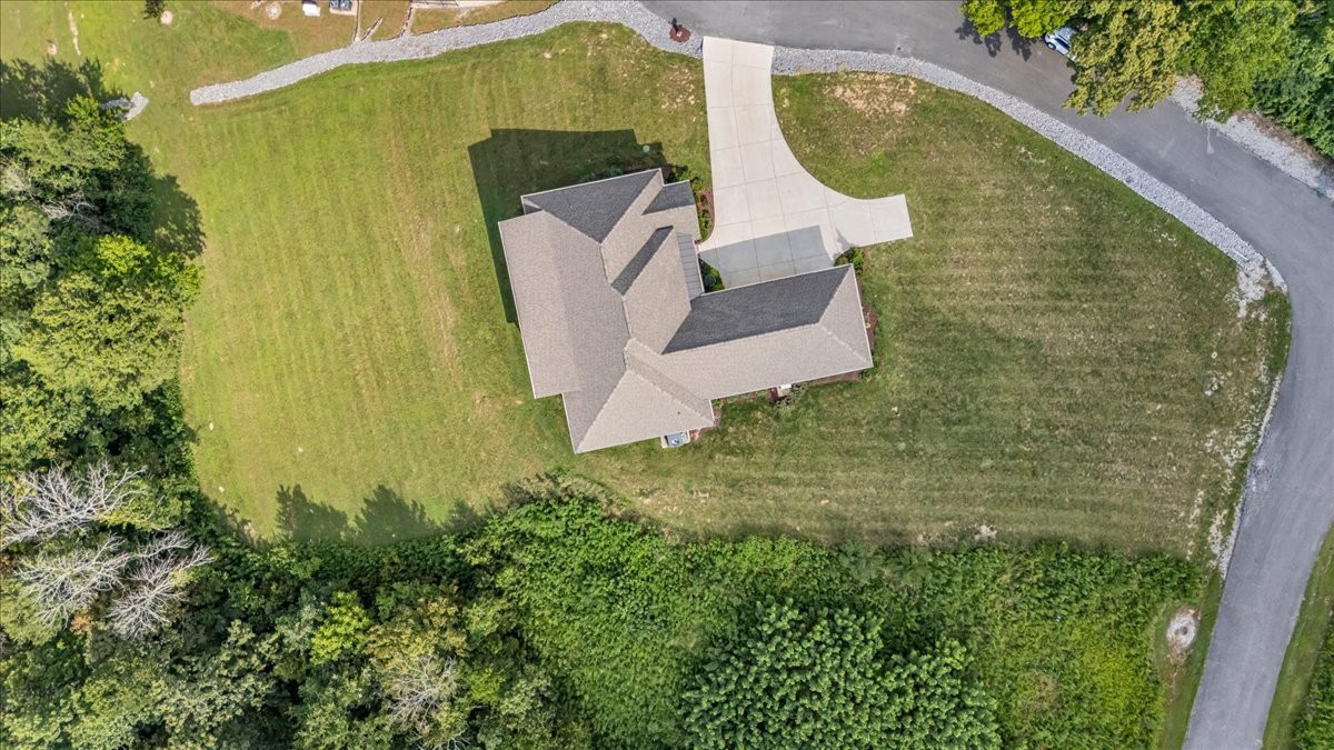 667 Rutherford Lane Smithville, TN 37166 - Photo 87 of 89 an aerial view of a house with a swimming pool