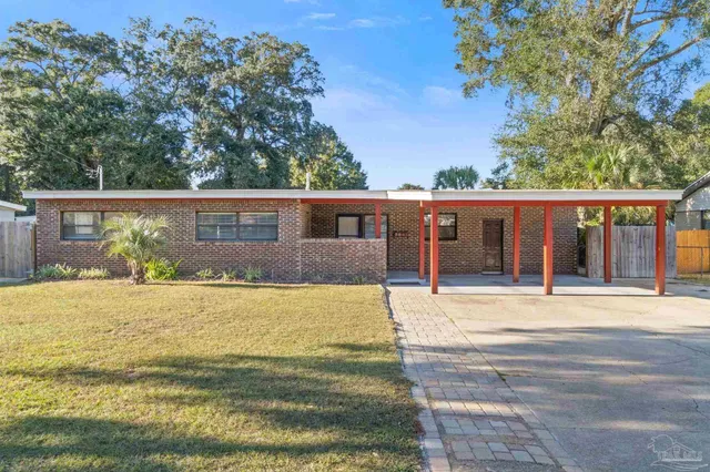 front view of a house with a big yard
