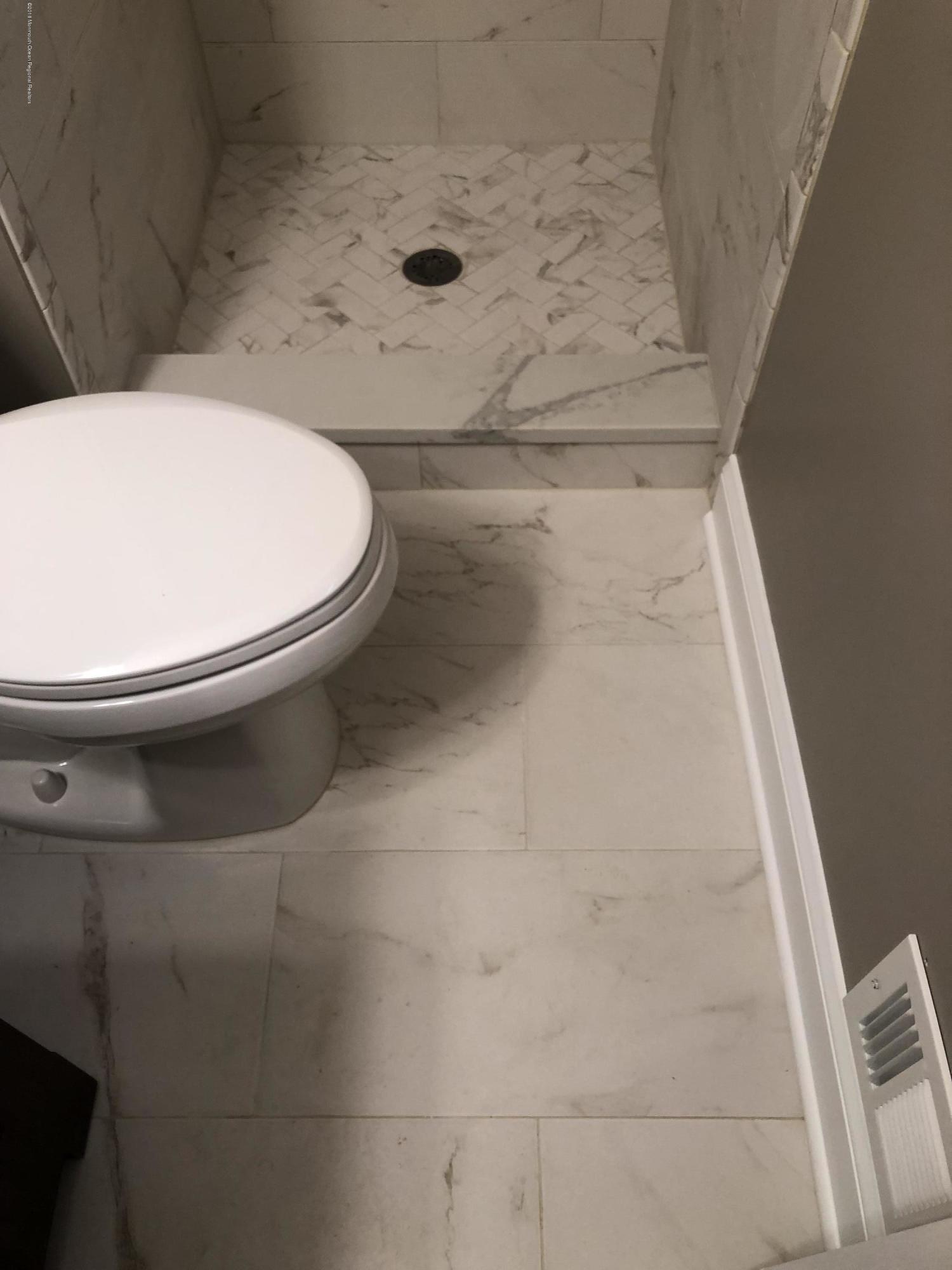100 Sargent Road Freehold, NJ 07728 - Photo 16 of 30 a bathroom with a toilet