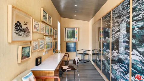 a view of house with swimming pool outdoor seating