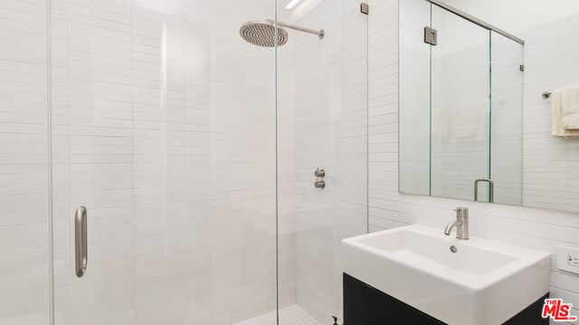 an aerial view of a house with a garden