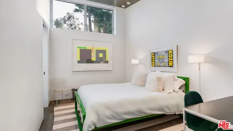 a swimming pool with outdoor seating and yard