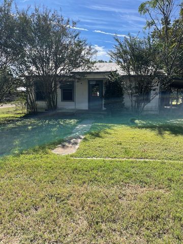 a view of a house with a swimming pool