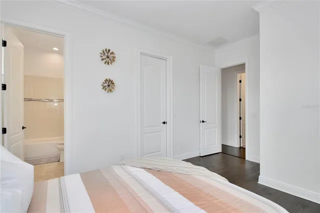 a spacious bathroom with a bathtub and shower