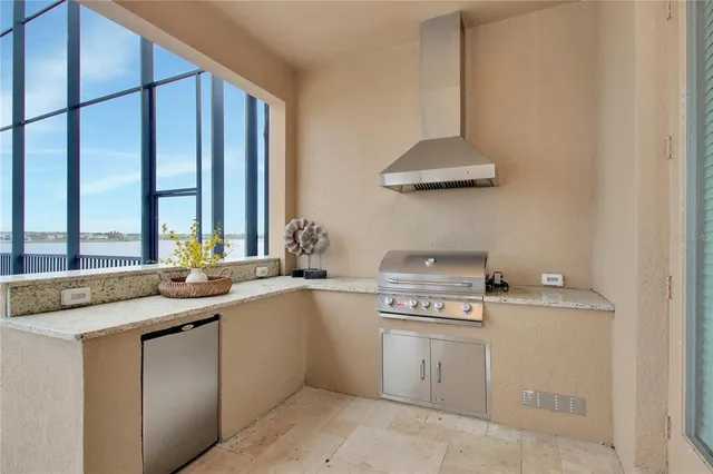 a kitchen with a sink and a stove
