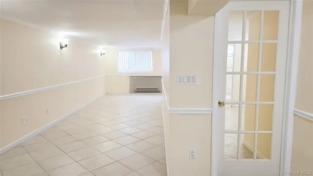 a view of a kitchen with an empty space