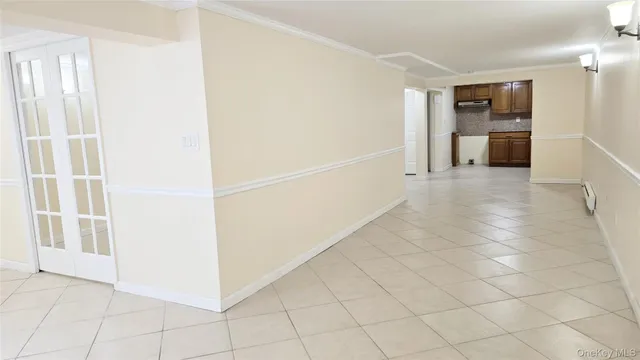 a view of a hallway with an entryway