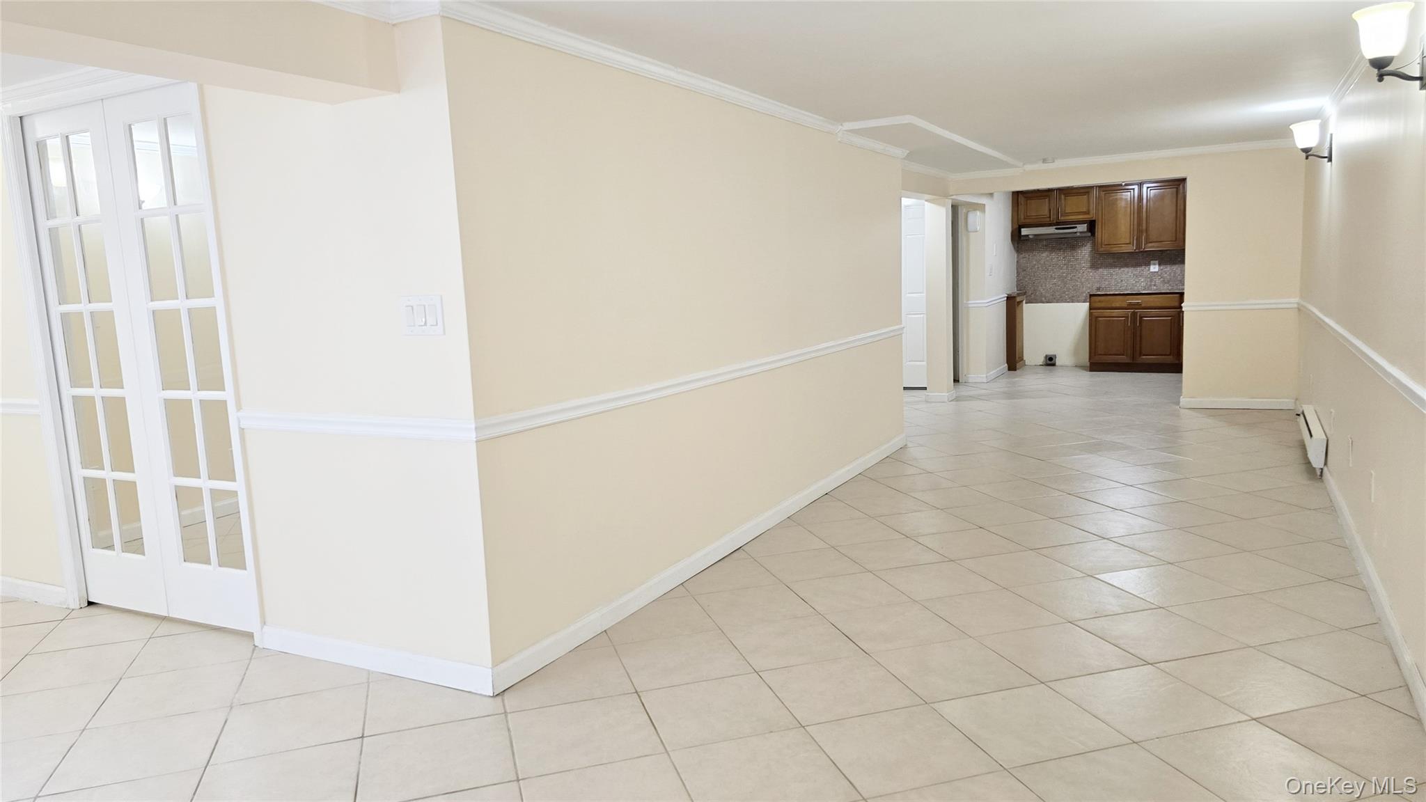 209-08 23rd Avenue Queens, NY 11360 - Photo 17 of 26 a view of a kitchen with an empty space