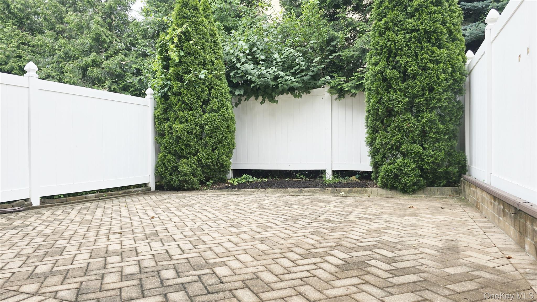 209-08 23rd Avenue Queens, NY 11360 - Photo 23 of 26 a view of a house with a backyard