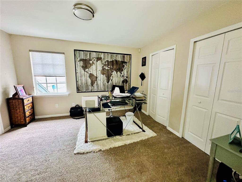 784 South Pennsylvania Avenue Winter Park, FL 32789 - Photo 27 of 29 a view of a livingroom with workspace and a window