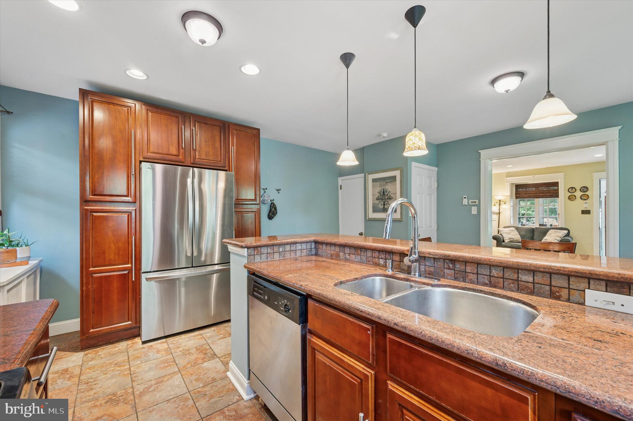 13 Chatham Road Ardmore, PA 19003 - Photo 18 of 35 a kitchen with sink refrigerator and microwave