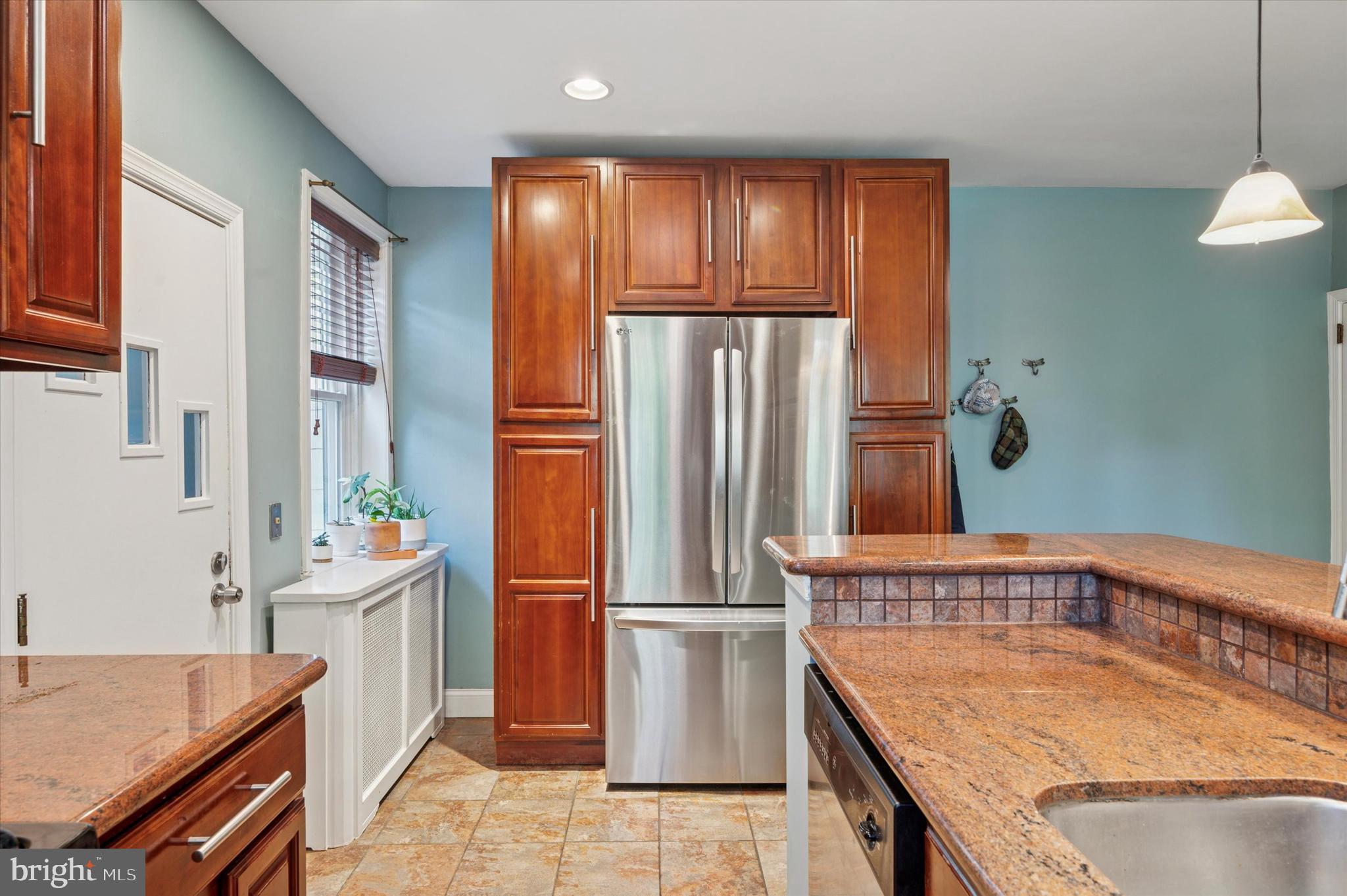 13 Chatham Road Ardmore, PA 19003 - Photo 20 of 35 a kitchen with stainless steel appliances granite countertop a refrigerator and a stove