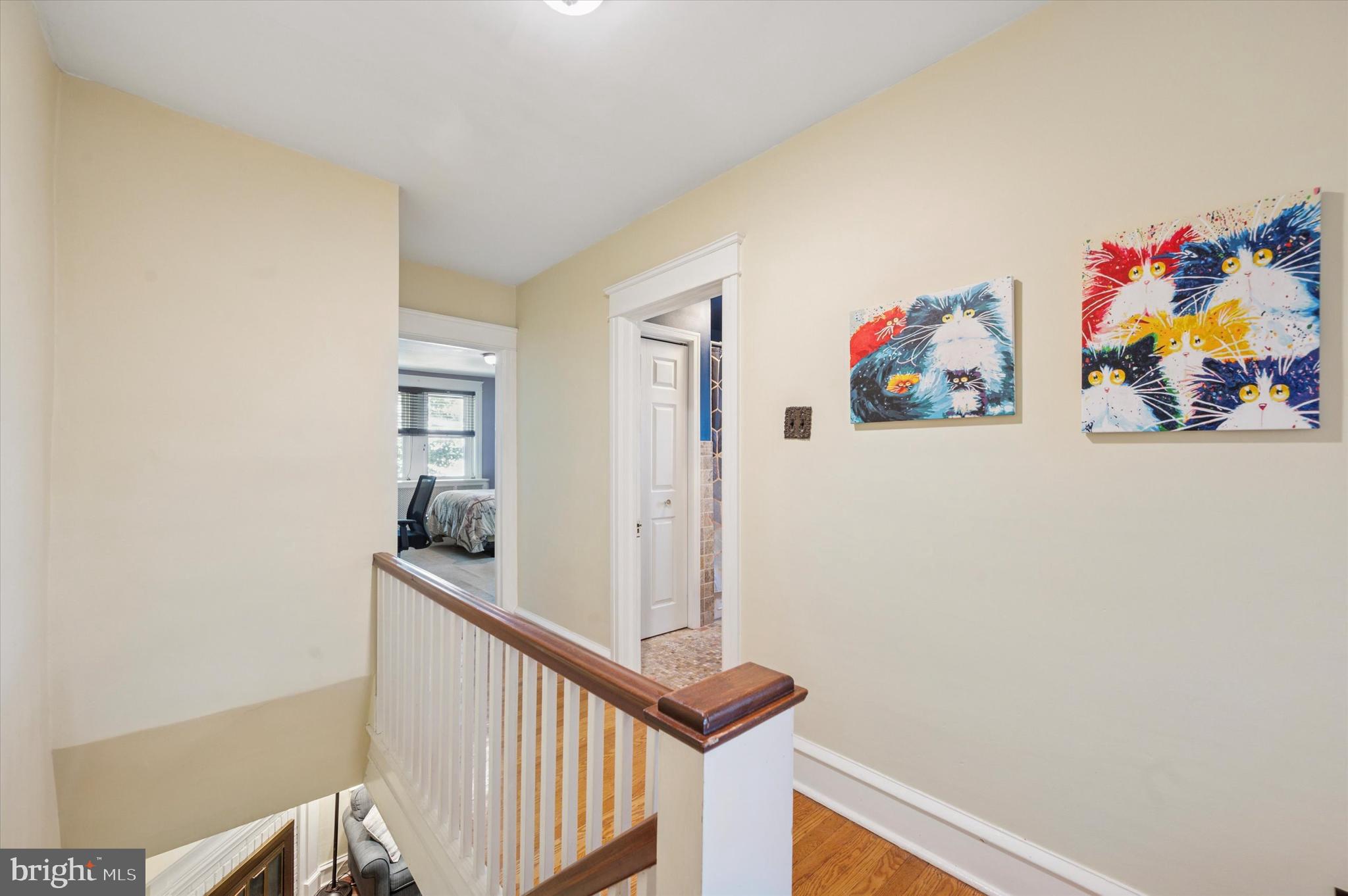 13 Chatham Road Ardmore, PA 19003 - Photo 21 of 35 a view of a hallway with paintings on the wall