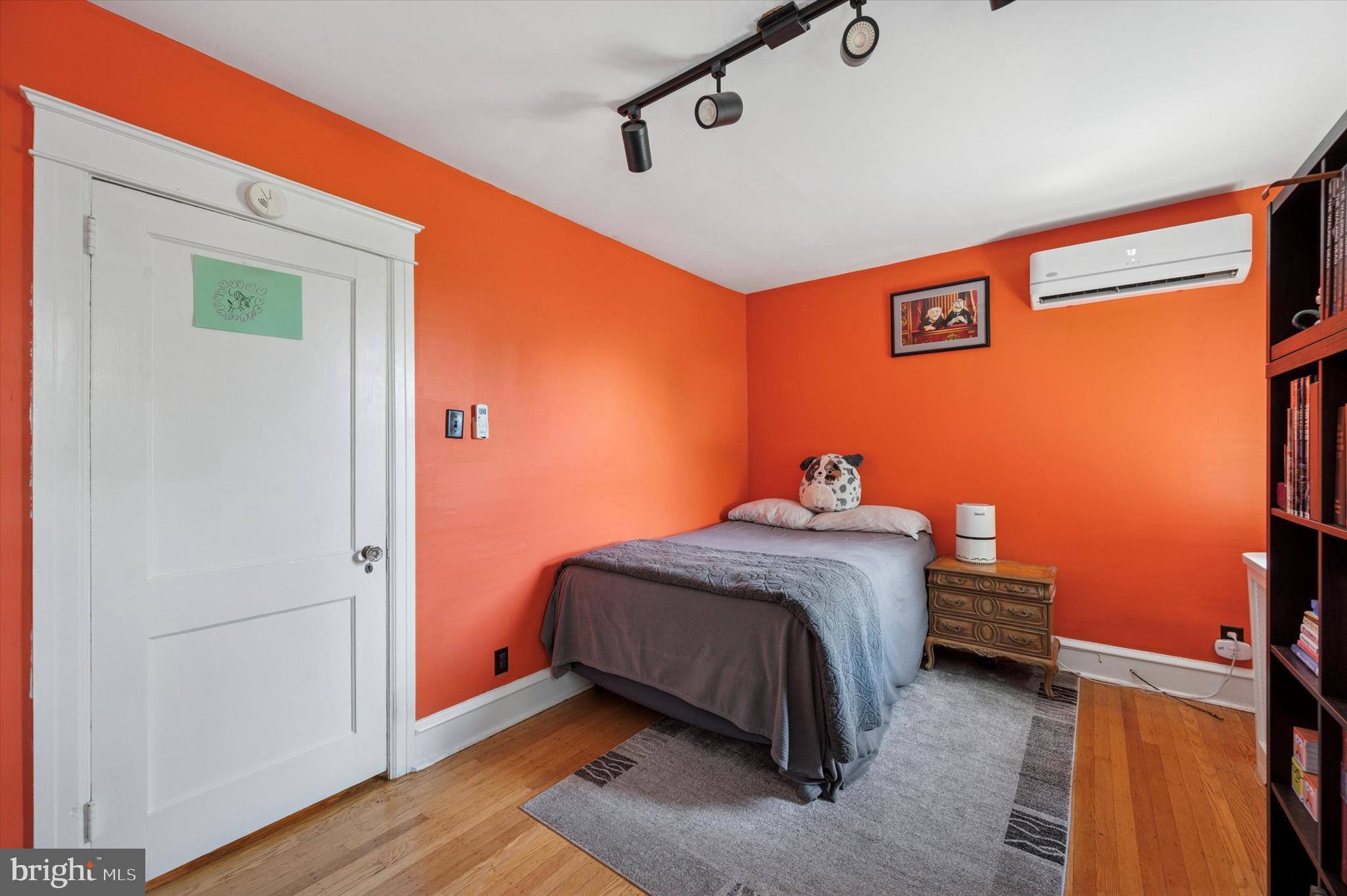 13 Chatham Road Ardmore, PA 19003 - Photo 23 of 35 a bedroom with a bed and wooden floor