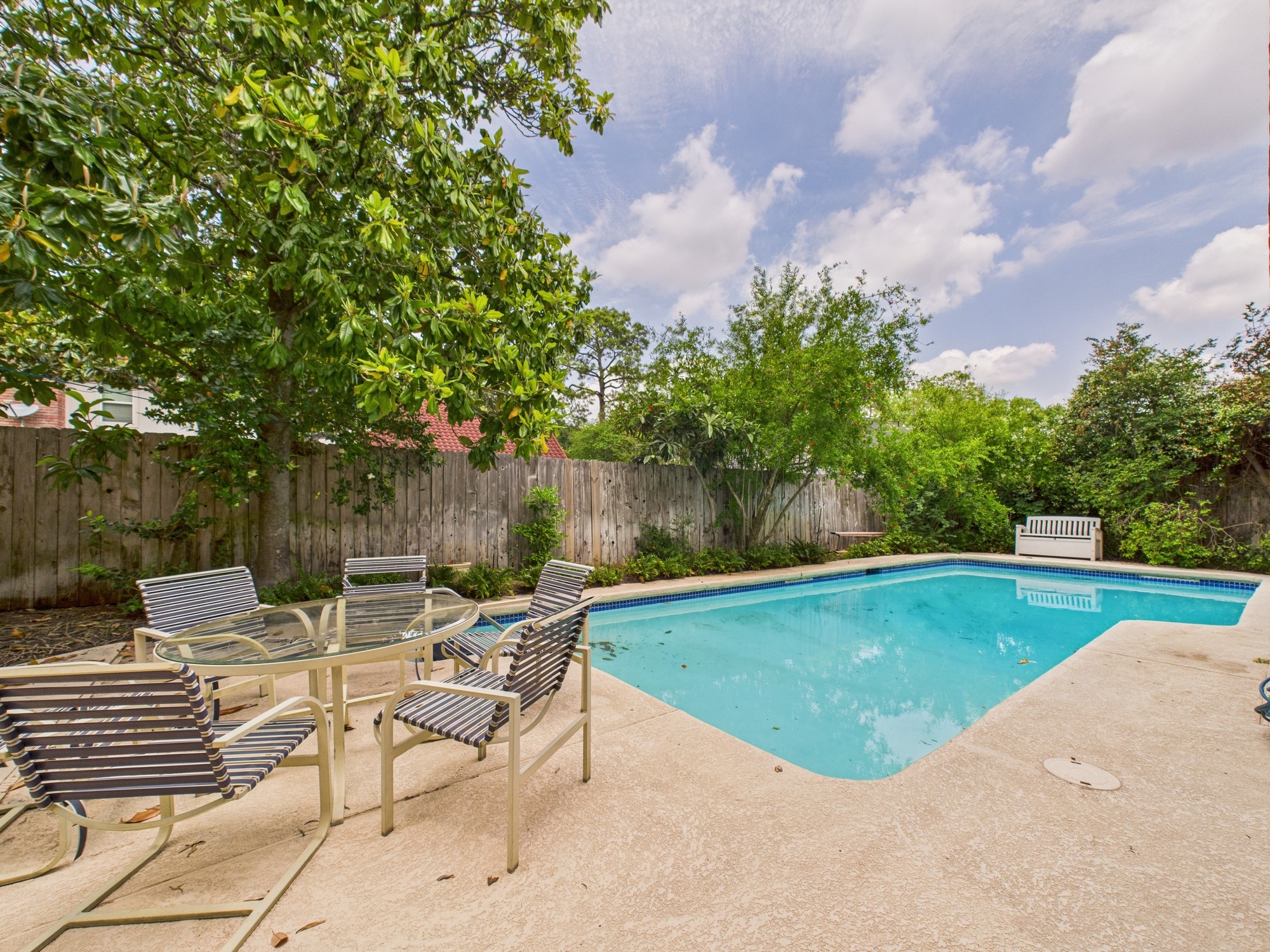 702 Daria Court Houston, TX 77079 - Photo 42 of 44 Step Onto the Patio and Enjoy the Swimming Pool