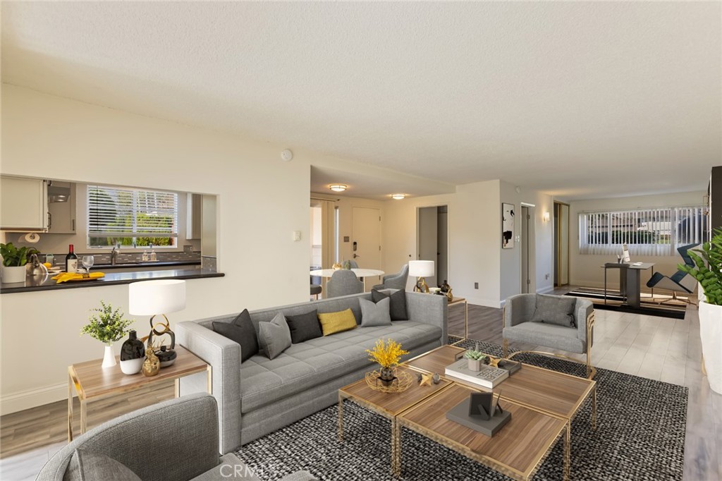 a living room with furniture and a table