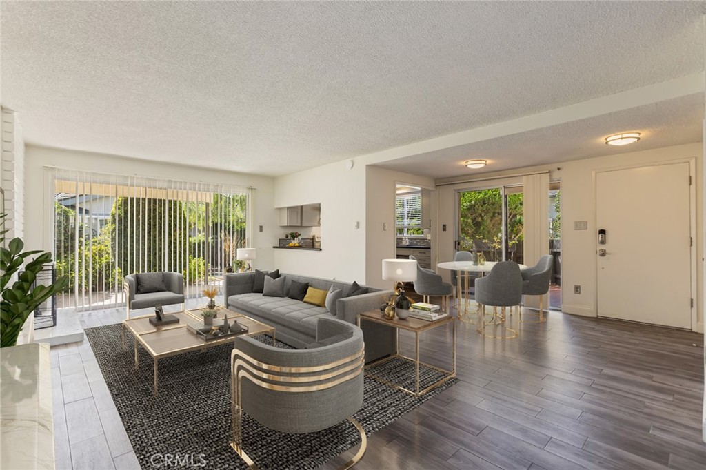 23033 Maple Avenue, Unit A Torrance, CA 90505 - Photo 13 of 45 a living room with furniture and wooden floor