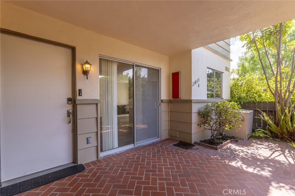 23033 Maple Avenue, Unit A Torrance, CA 90505 - Photo 2 of 45 a view of a entryway door front of house