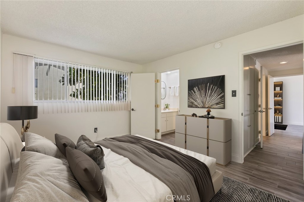 23033 Maple Avenue, Unit A Torrance, CA 90505 - Photo 24 of 45 a bedroom with a bed and a flat screen tv