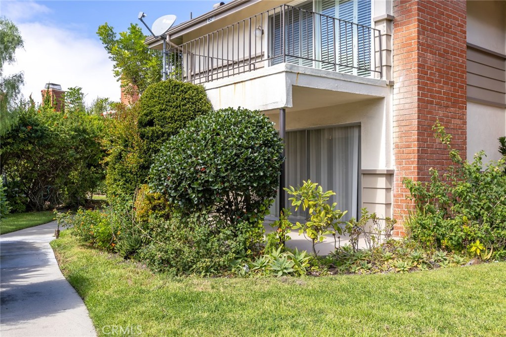 23033 Maple Avenue, Unit A Torrance, CA 90505 - Photo 31 of 45 a view of a pathway of a house with a yard