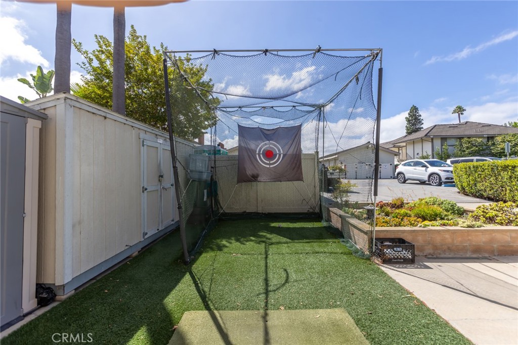 23033 Maple Avenue, Unit A Torrance, CA 90505 - Photo 40 of 45 a view of a chairs and table in backyard