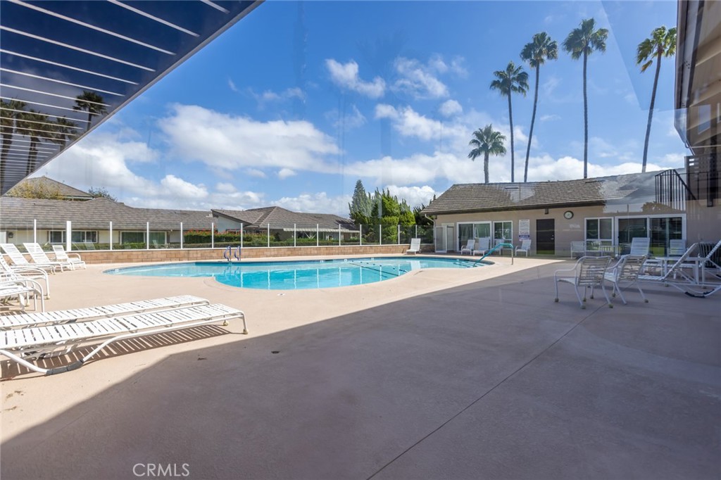 23033 Maple Avenue, Unit A Torrance, CA 90505 - Photo 41 of 45 a view of swimming pool in front of residential houses