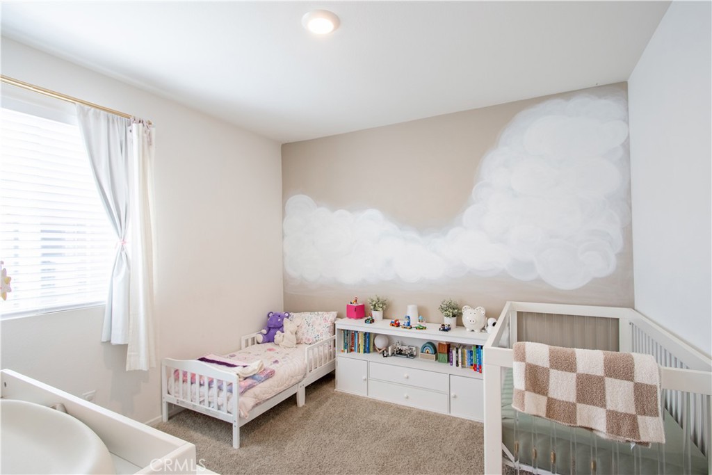 28397 Partridge Way, Unit 1001 Murrieta, CA 92563 - Photo 27 of 47 a living room with furniture and white walls