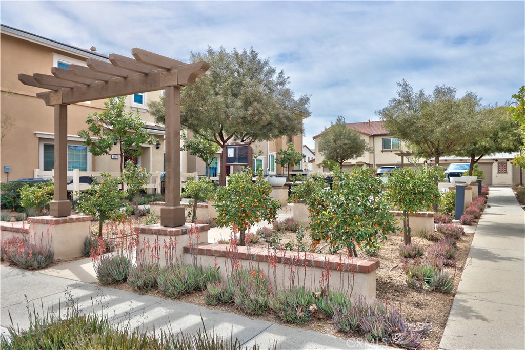 28397 Partridge Way, Unit 1001 Murrieta, CA 92563 - Photo 36 of 47 a view of a chair and tables in the patio