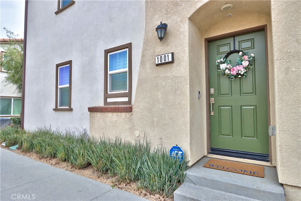 28397 Partridge Way, Unit 1001 Murrieta, CA 92563 - Photo 47 of 47 a front view of a house having yard