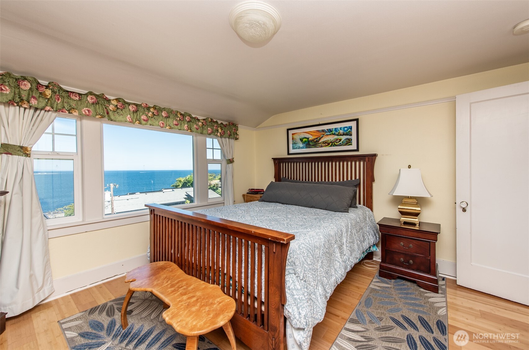 410 East Front Street Port Angeles, WA 98362 - Photo 31 of 32 a bedroom with a bed and a window