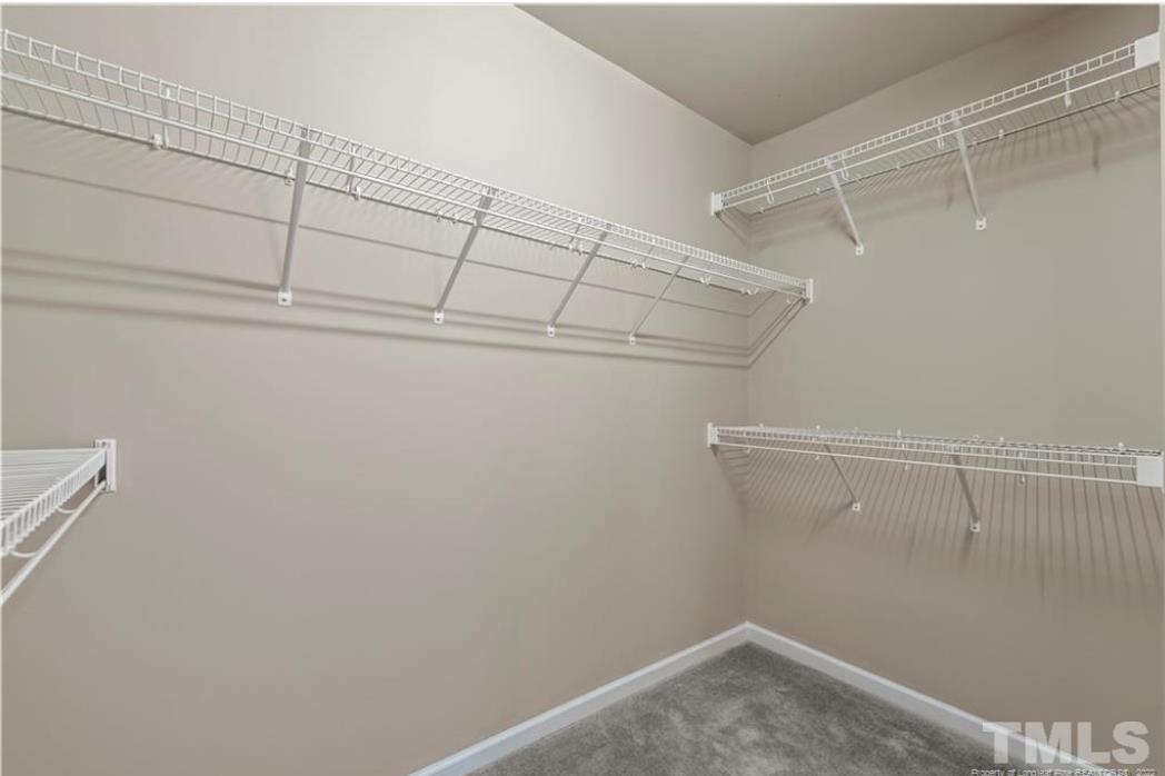 144 Bicentennial Way Cameron, NC 28326 - Photo 16 of 27 a view of a room with racks on the wall
