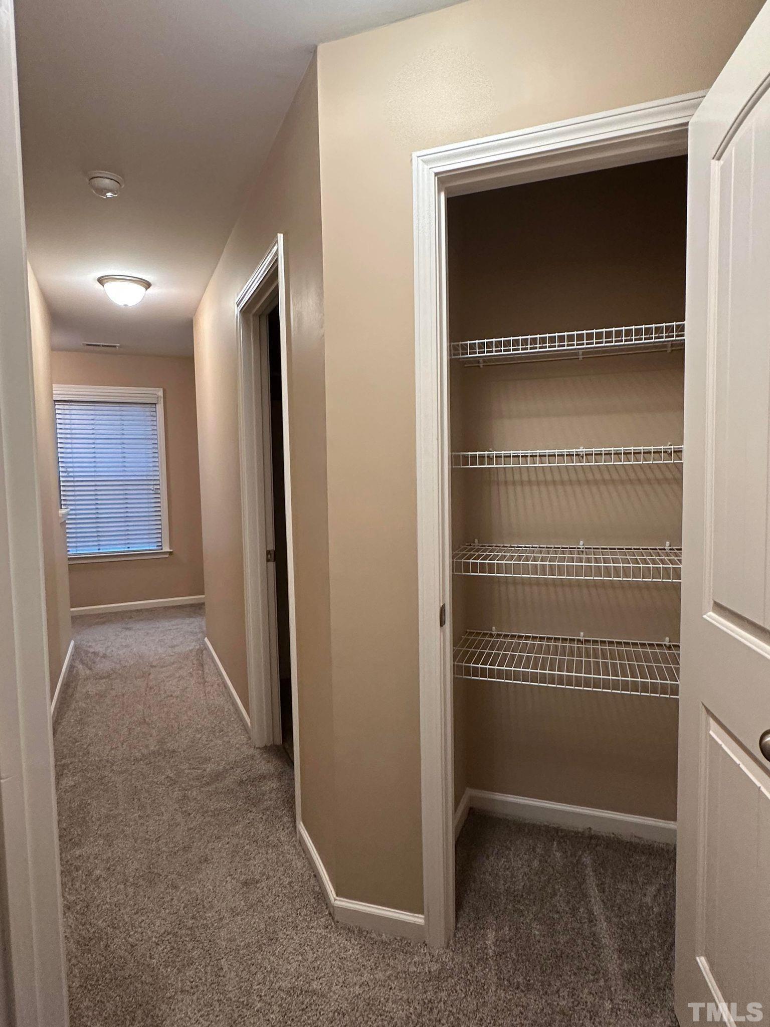 144 Bicentennial Way Cameron, NC 28326 - Photo 18 of 27 a view of livingroom with a hallway