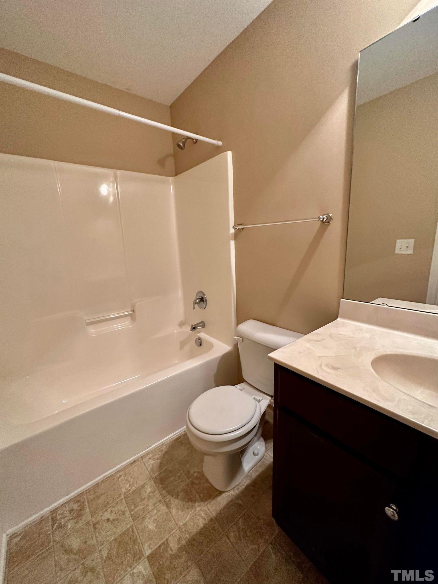 144 Bicentennial Way Cameron, NC 28326 - Photo 19 of 27 a bathroom with a sink a toilet and shower