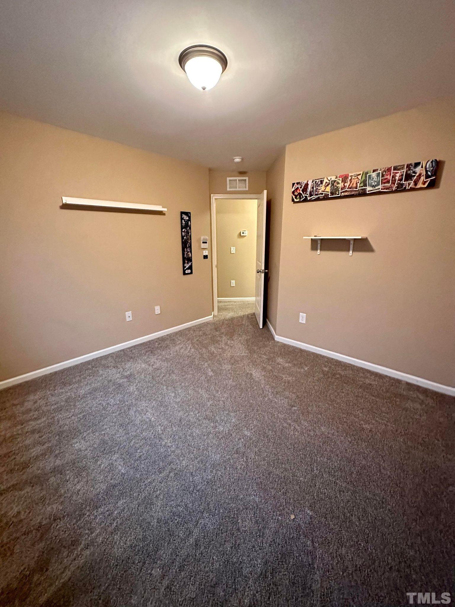 144 Bicentennial Way Cameron, NC 28326 - Photo 20 of 27 an empty room with a empty space