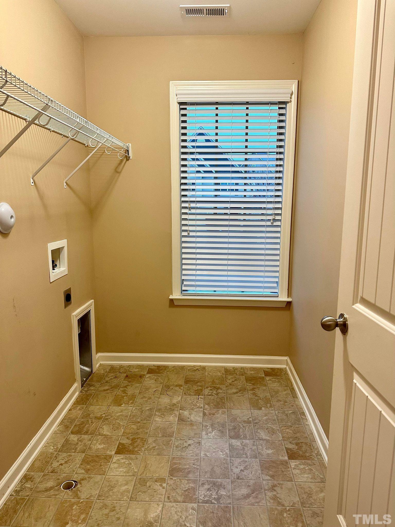 144 Bicentennial Way Cameron, NC 28326 - Photo 23 of 27 a view of a bathroom with a window