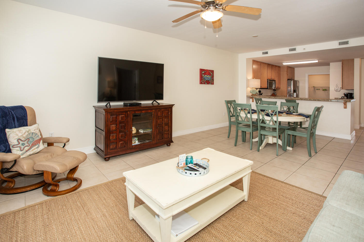 43 Cassine Way, Unit 402 Santa Rosa Beach, FL 32459 - Photo 17 of 52 a living room with furniture and a flat screen tv