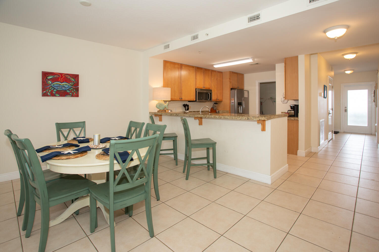 43 Cassine Way, Unit 402 Santa Rosa Beach, FL 32459 - Photo 19 of 52 a view of a dining room with furniture