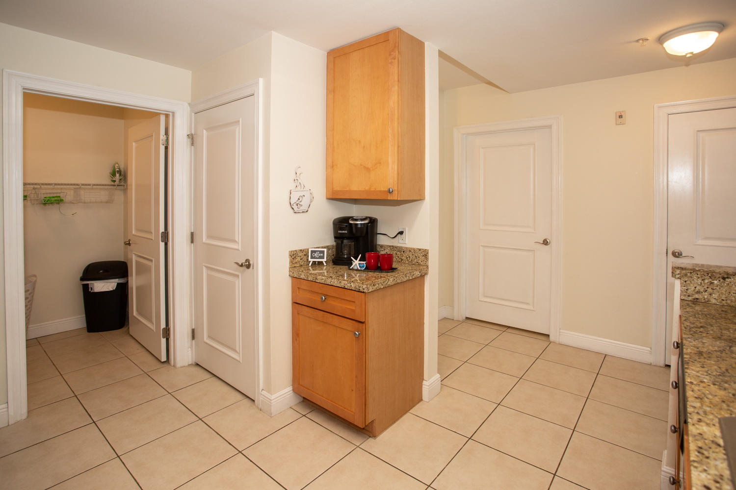 43 Cassine Way, Unit 402 Santa Rosa Beach, FL 32459 - Photo 24 of 52 a kitchen with stainless steel appliances granite countertop a refrigerator and a stove