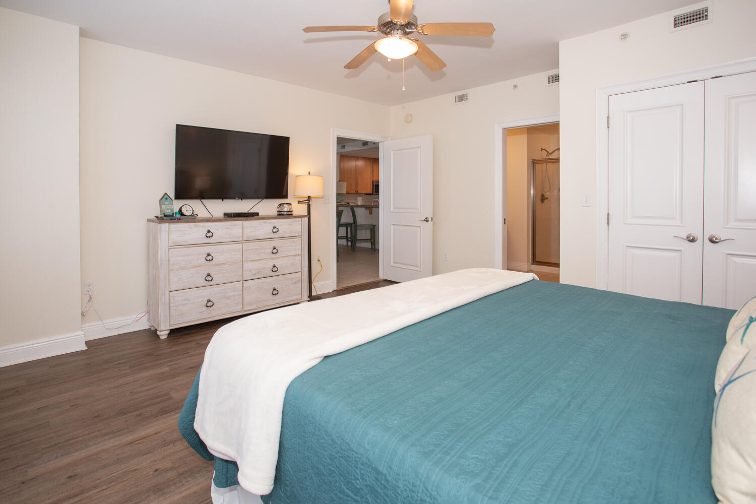 43 Cassine Way, Unit 402 Santa Rosa Beach, FL 32459 - Photo 28 of 52 a bedroom with a bed and a flat screen tv