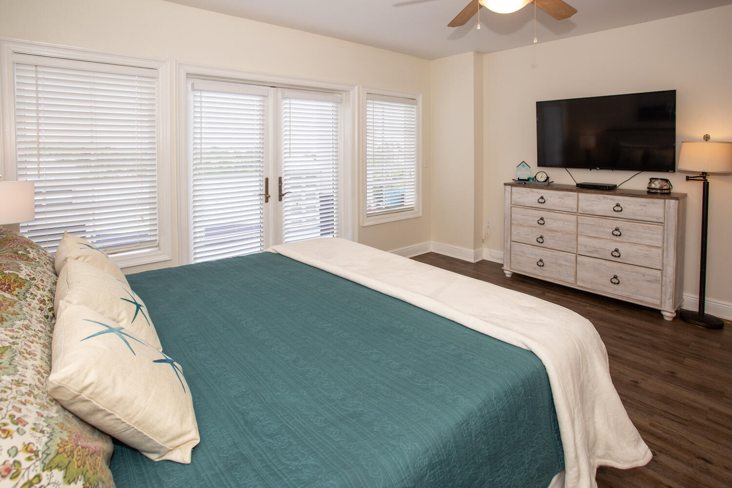 43 Cassine Way, Unit 402 Santa Rosa Beach, FL 32459 - Photo 31 of 52 a bedroom with a bed and a flat screen tv