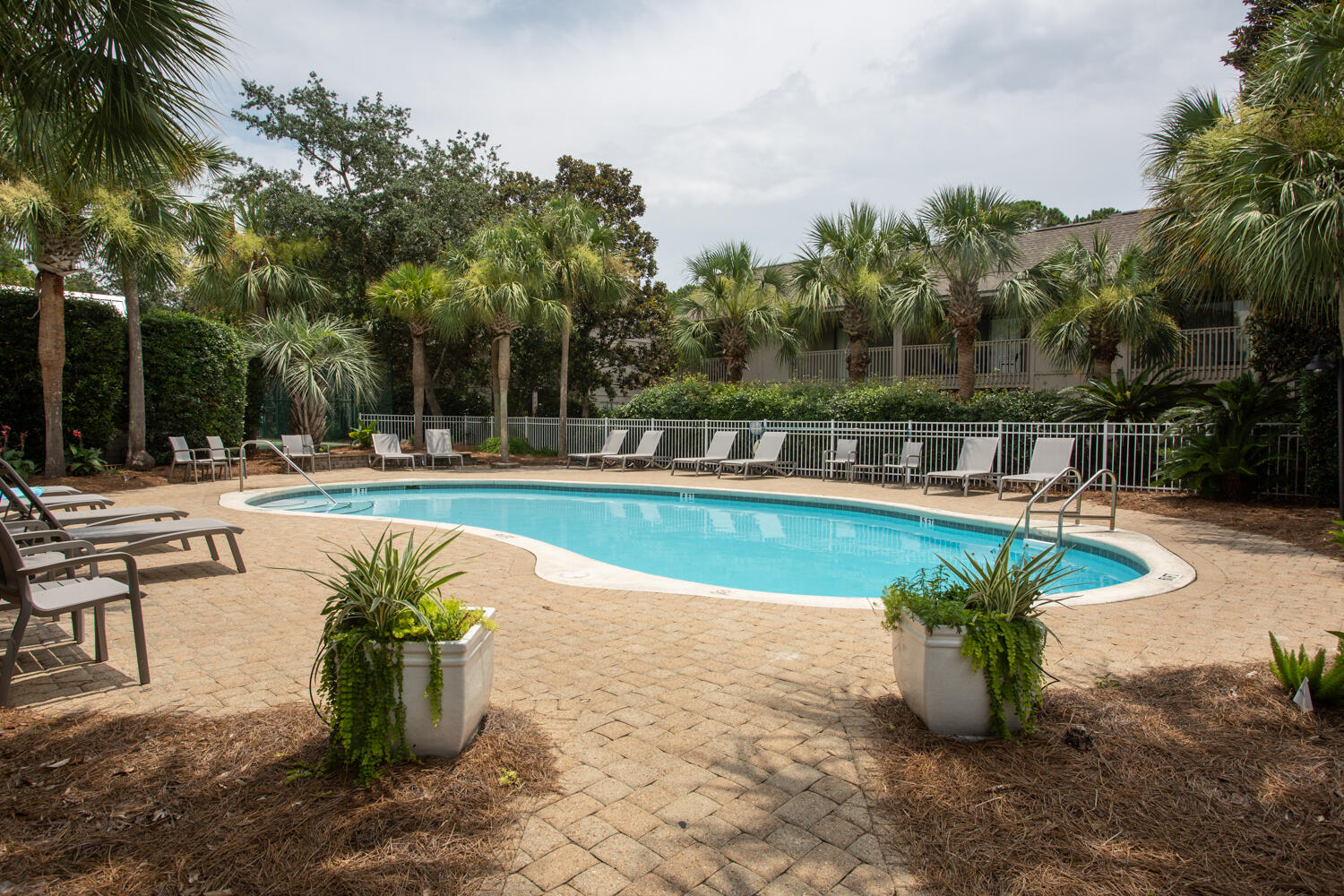 43 Cassine Way, Unit 402 Santa Rosa Beach, FL 32459 - Photo 43 of 52 a view of a swimming pool with a patio
