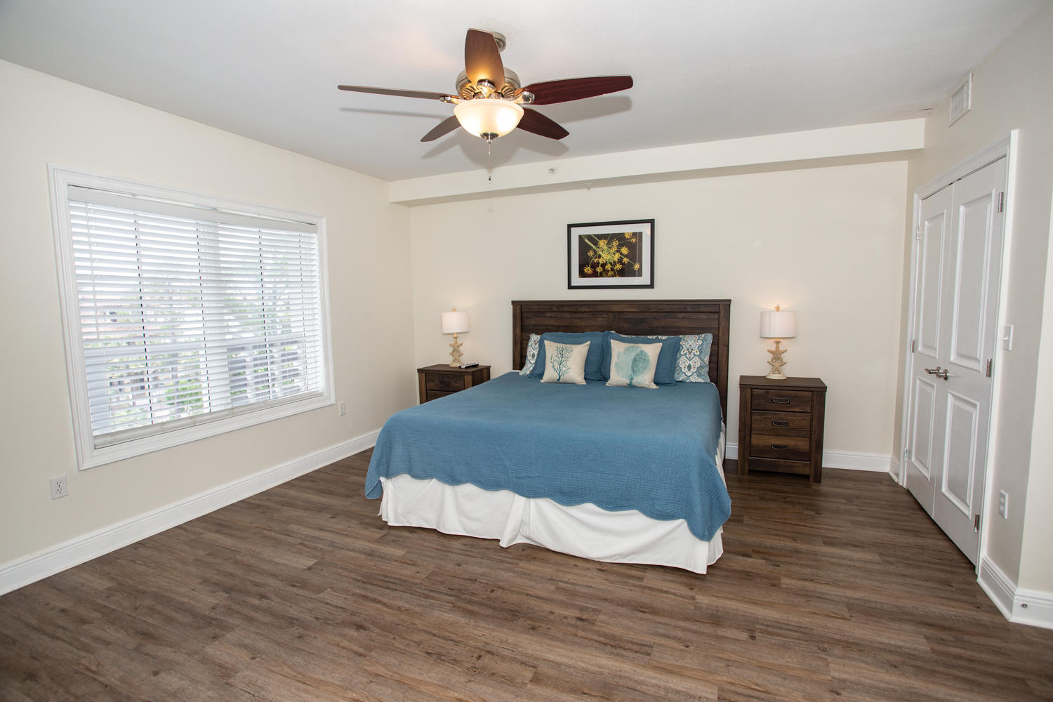 43 Cassine Way, Unit 402 Santa Rosa Beach, FL 32459 - Photo 7 of 52 a bedroom with a bed and a large window